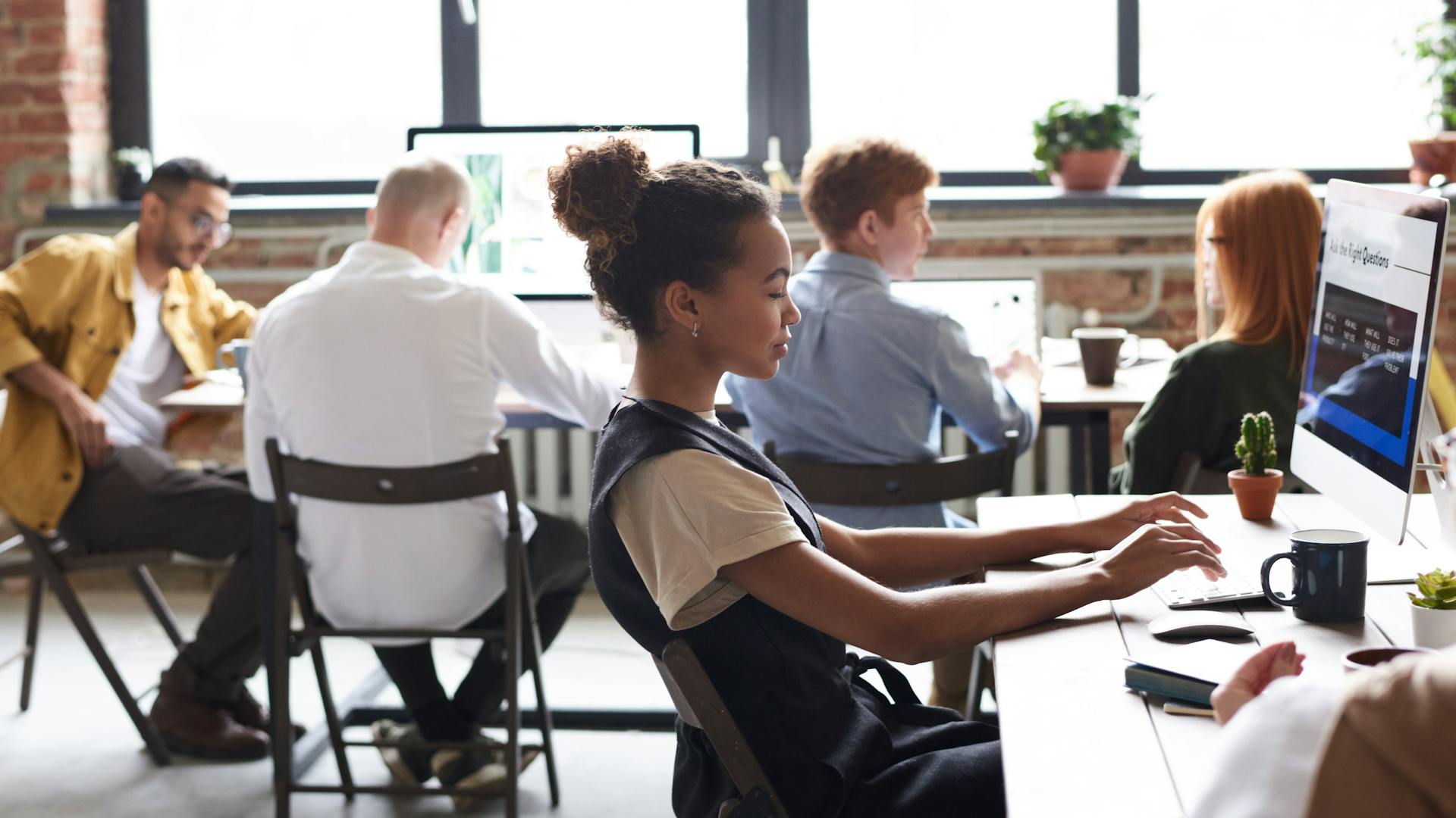 Diverse team working in a modern office environment